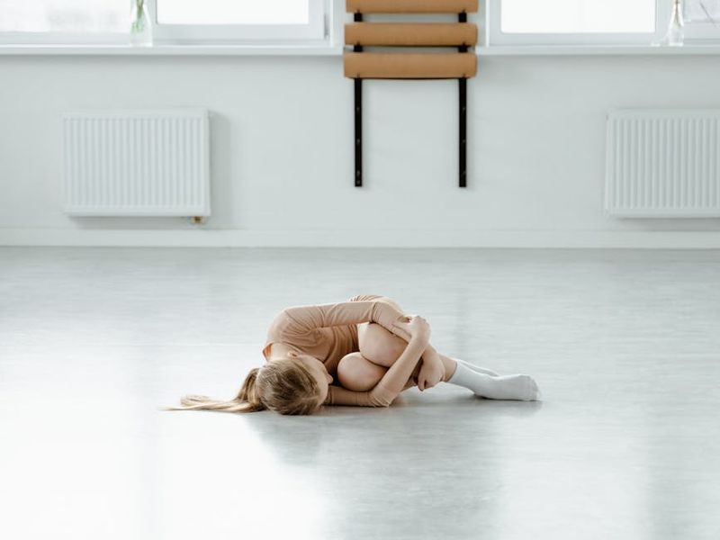 Minimalist yoga studio interior with soft lighting